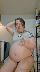 1734923486_chugging-arizona-iced-tea-on-a-completely-full-stuffed-bell_0.mp4