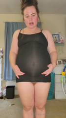 1415723195_trying-on-old-dresses-and-struggling-i-cannot-believe-thes_0.mp4